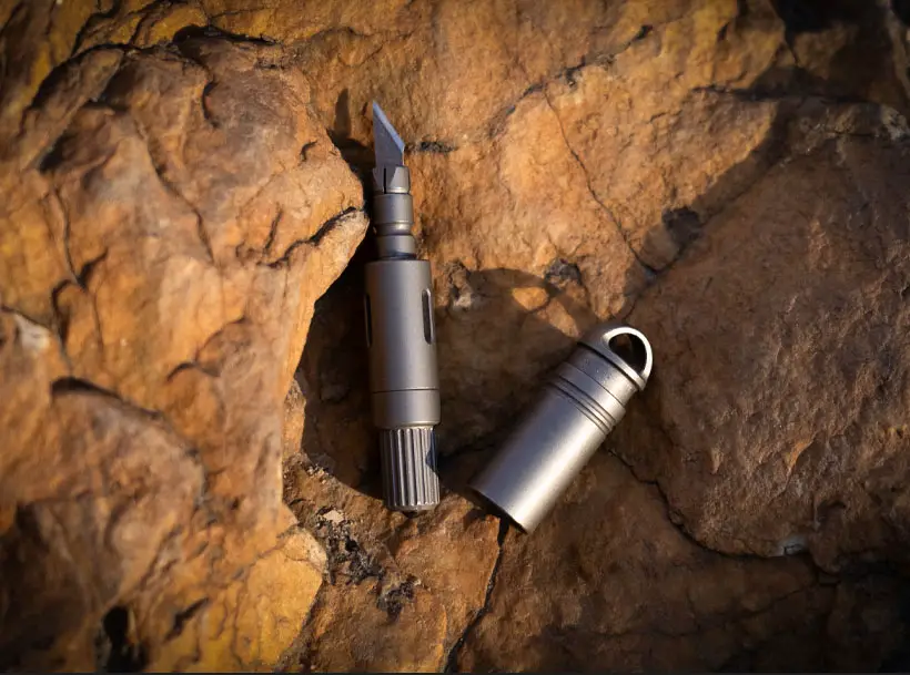 DartInk: Quick-Release Titanium Mini Pen & Knife