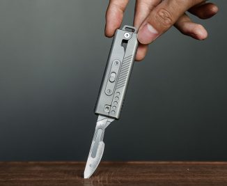 TiRoto Titanium Pocket Knife with Snap-Flick Action