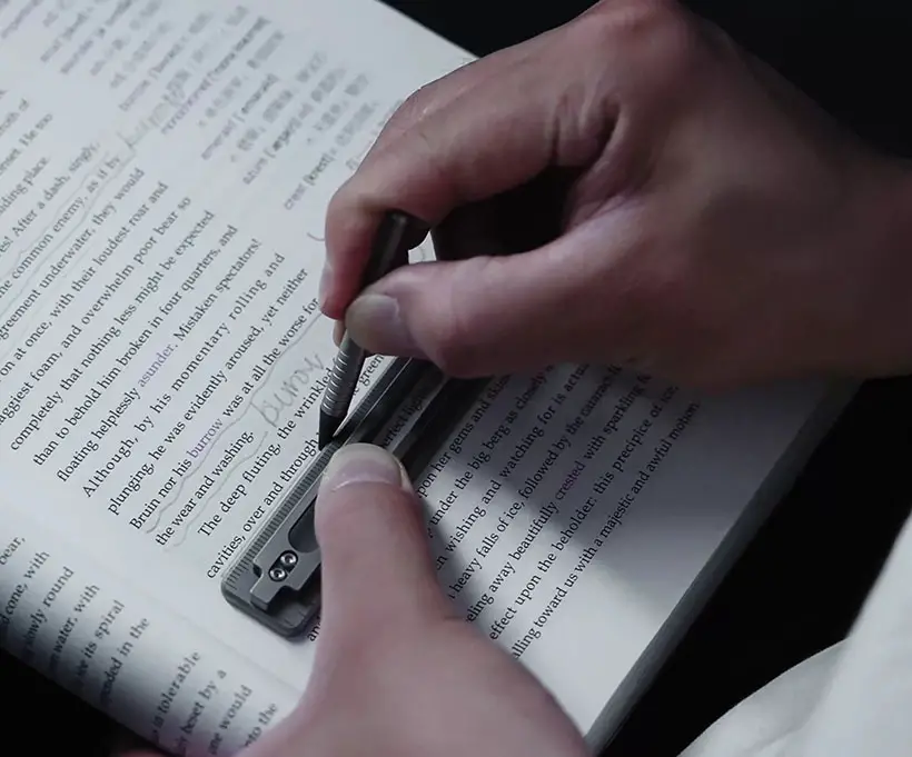 The BookBond Pen - Titanium Multitool Bookmark and a Pen in One