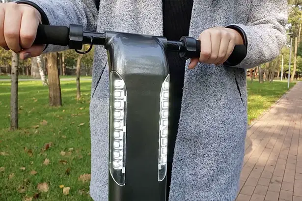 BooZter Folding Electric Scooter That Fits Into Your Backpack by WheelKinetic