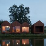 Small Cottage Near a Pond Was Inspired by Traditional Fisherman's Cabins by Studio A111