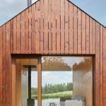 Small Cottage Near a Pond Was Inspired by Traditional Fisherman's Cabins by Studio A111