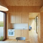 Small Cottage Near a Pond Was Inspired by Traditional Fisherman's Cabins by Studio A111