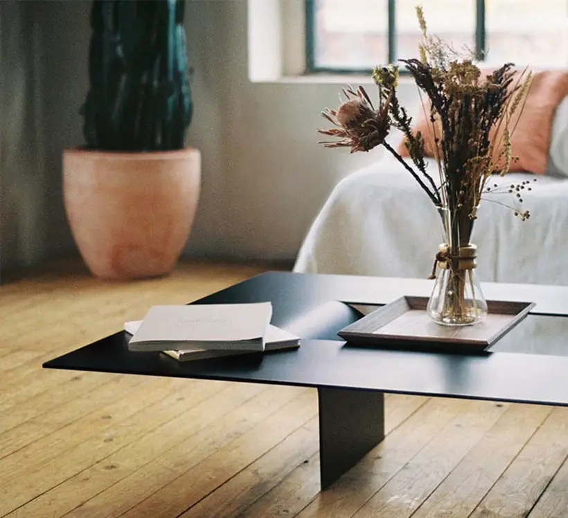 CUT Coffee Table Looks Like Floating In The Middle of The Room by Johannes Budde