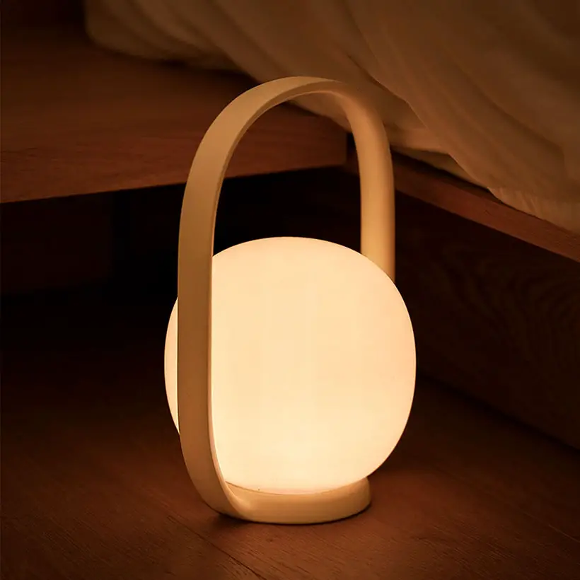 En Haut Portable Lamp by Leemok Design Studio