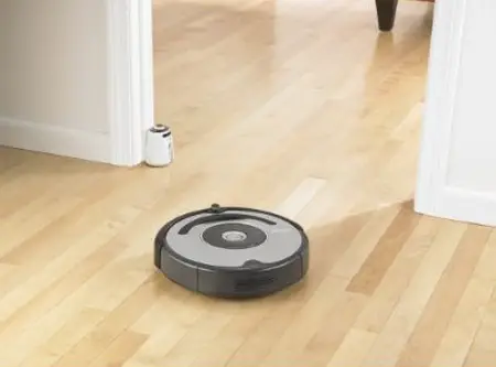 irobot 560 roomba vacuuming robot