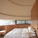 Mushroom Wooden House In The Middle of Pine Forest by ZJJZ Architects