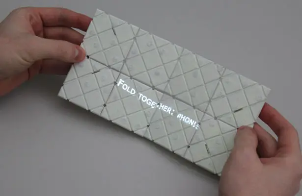 Paddle Shapeshifting Smartphone Inspired by Rubik's Puzzle