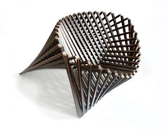 A Flat Wooded Surface that Rises Into a Chair – A Sculptural Beauty!