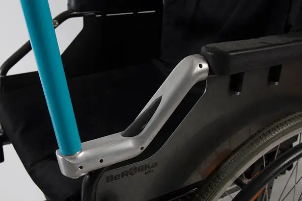 Side by Side Handle for Wheelchair Allows Caregiver to Walk Alongside The Person Seated in The Chair