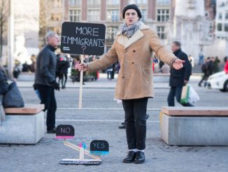 Street Debaters Evoke a Friendly Discussion with Strangers While Collecting Coins