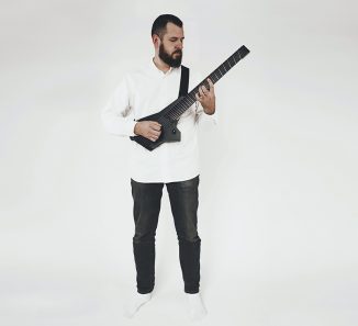 Yachts Inspired Type V Travel Electric Guitar Features Ergonomic Body Design