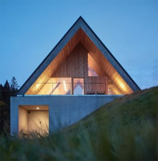 Weekend House in Beskydy Uses Concrete and Larch Wood as Its Main Materials