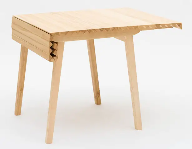 Expandable Wooden Cloth Table by Nathalie Dackelid