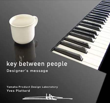 yamaha piano key between people