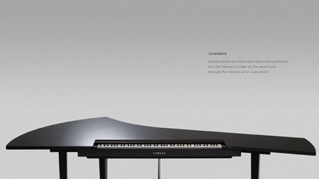 yamaha piano key between people